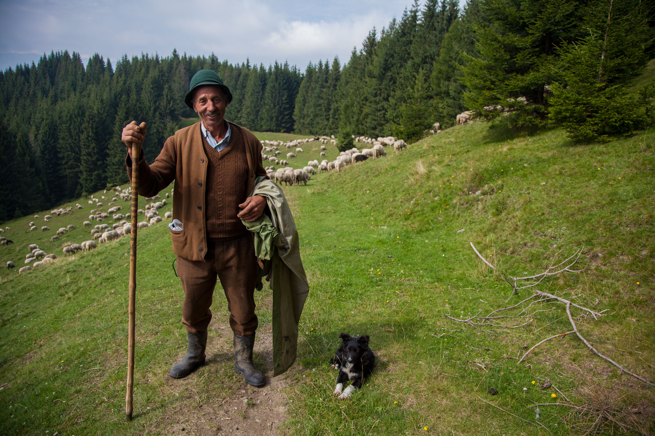 Romanian shepherd and his dog - photo by Cinty Ionescu and featured in this album on Flickr and shared under a CC BY 2.0 Creative Commons License