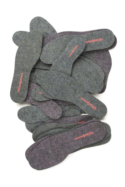 "Award winning felt Insoles made of production waste from garments in various colours. Can be worn even indoors due to their insulating and moisture management properties" - interesting recycled wool shoe insoles from Swedish company, Woolpower